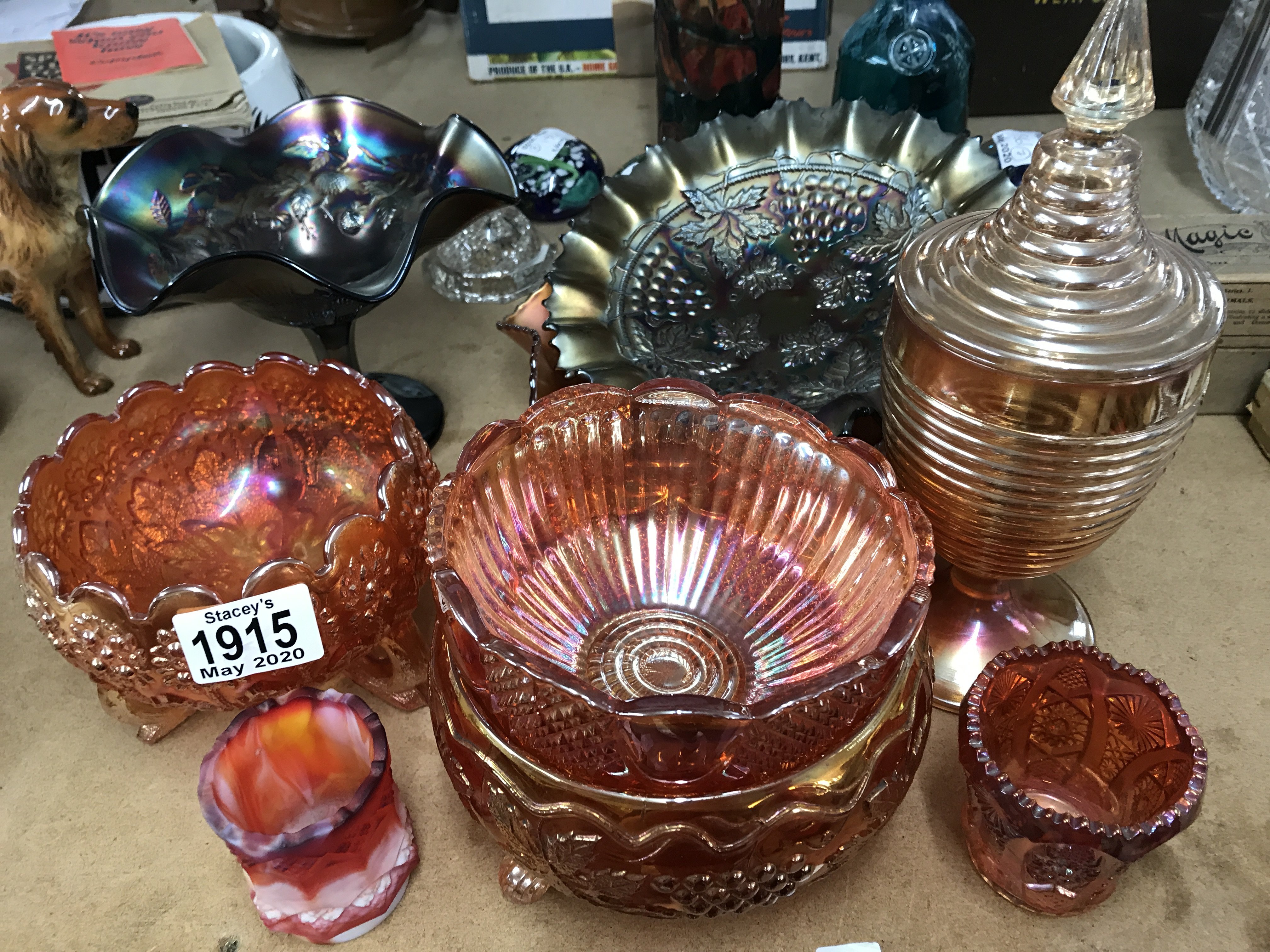 A small collection of Carnival glass. (9)