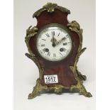 A late 19th century French mantel clock with gilt