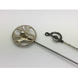 Two Charles Horner silver hatpins, one in the form