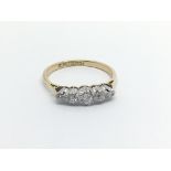 An 18carat gold ring set with a row of five diamonds ring size N-O