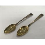 Two Georgian silver berry spoons, London hallmarks
