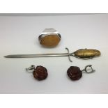 Silver and amber items comprising a pair of earrin