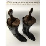 A pair of 19thC leather riding boots with trees.