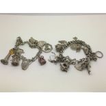 Two sterling silver charm bracelets, approx 94g.