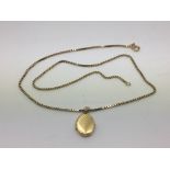 A 9ct gold locket and chain, approx 8g.