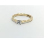An unmarked gold solitaire diamond ring, approx 0.15ct, approx 2.8g and approx size M- N.