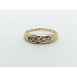 An 18ct gold vintage five stone diamond ring, appr