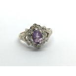 A 9ct gold amethyst and diamond ring, approx 3.4g