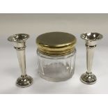 A pair of small silver bud vases, Birmingham hallm