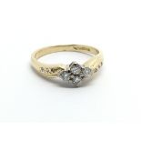 An 18ct gold four stone diamond ring, approx .20ct