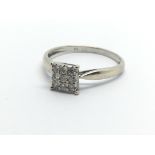 A 9ct white gold nine stone diamond ring, approx .