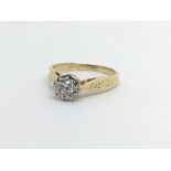 An 18ct gold ten point solitaire diamond ring, approx 2.8g and approx size H.