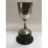 A silver trophy cup, London hallmarks. Height appr