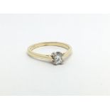 An unmarked gold solitaire diamond ring set with a princess cut diamond, approx .20ct, approx 2.4g