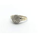 A 9ct gold diamond cluster ring, approx 2g and approx size L.