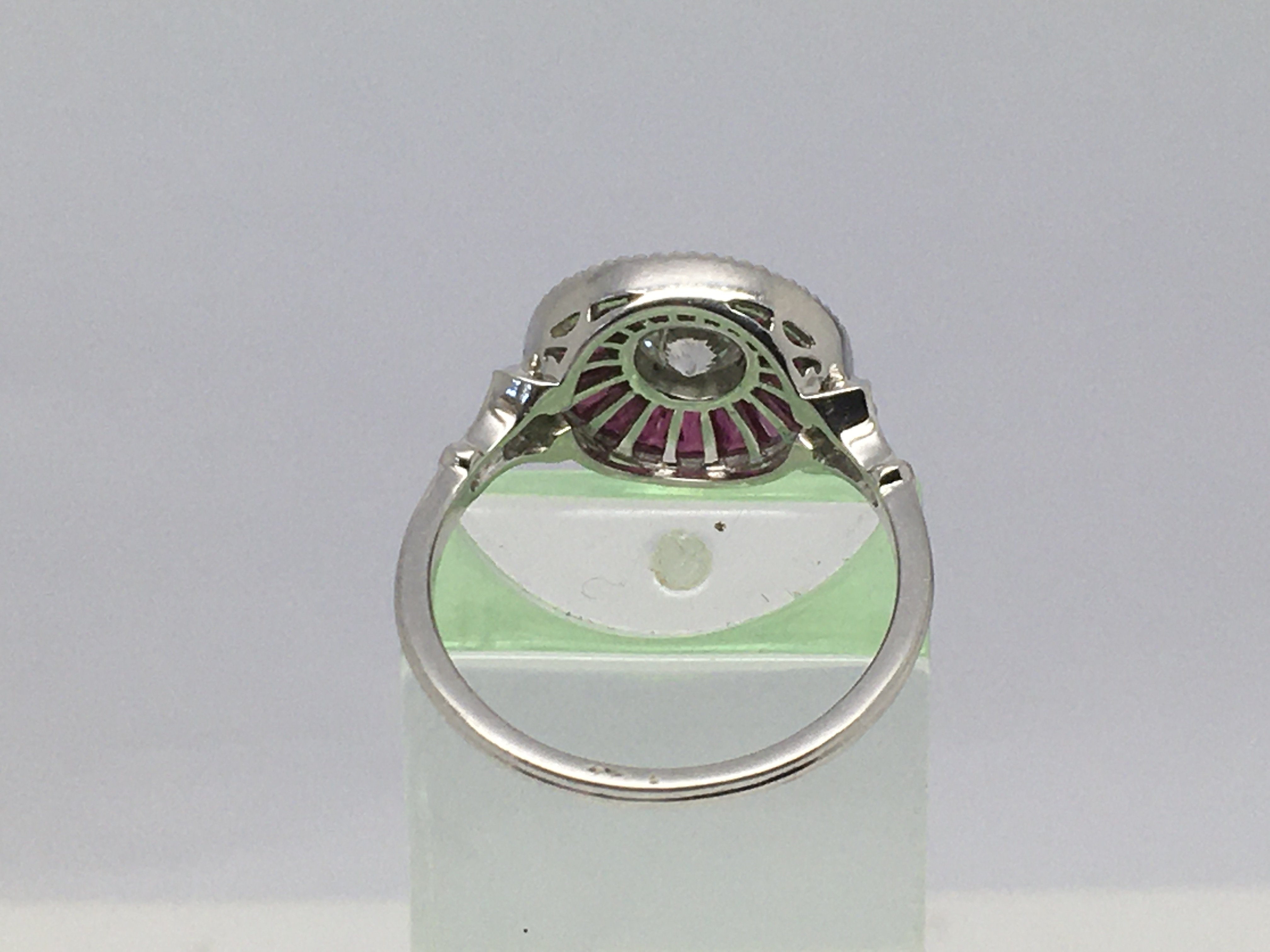 A platinum and diamond ring set with a circular ro - Image 2 of 2