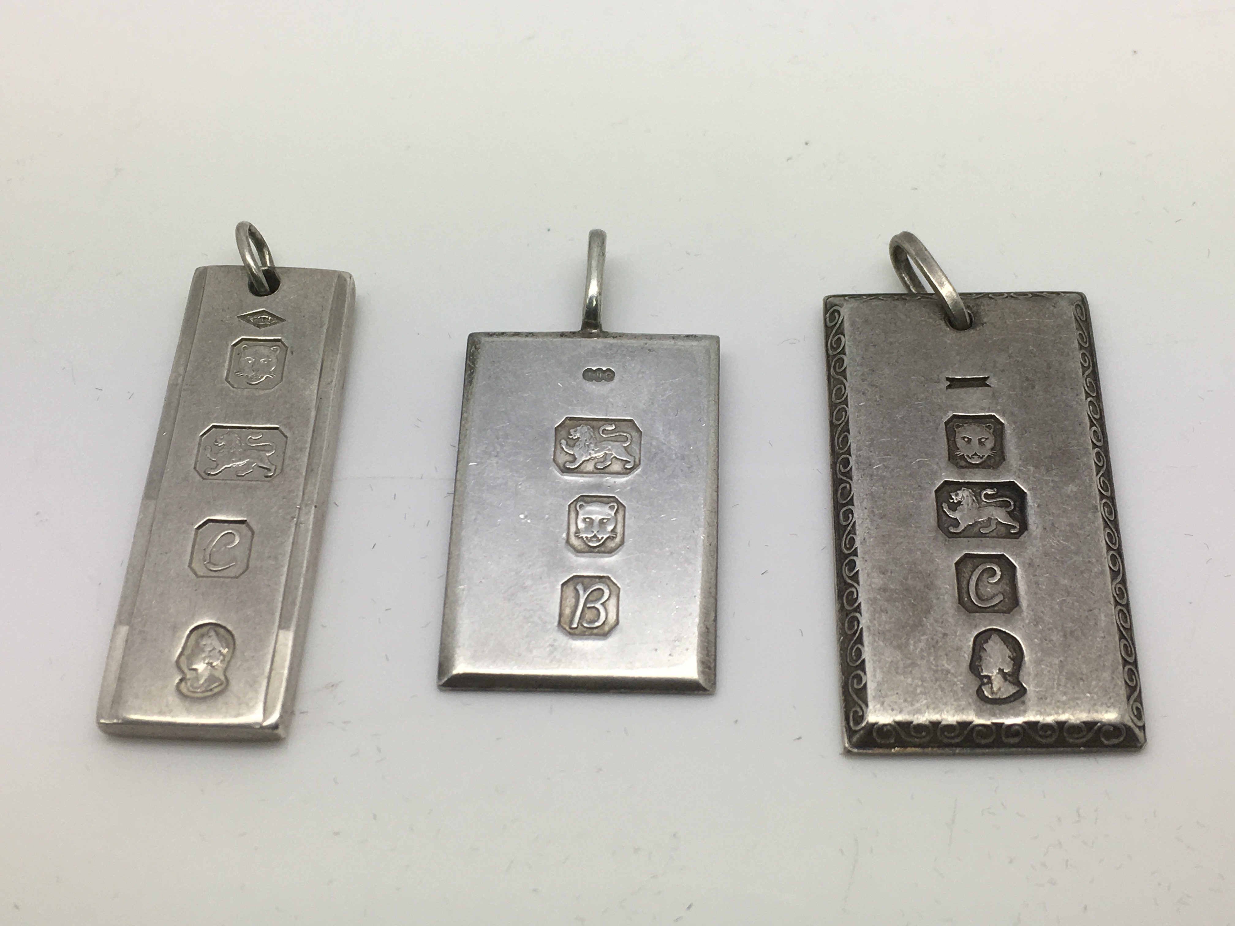 Three sterling silver ingots, approx 38g.