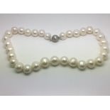 A cultured pearl necklace with a 9ct white gold ba