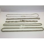 Five sterling silver chains.