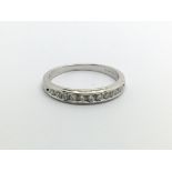 A 9ct white gold half eternity diamond ring, stones missing, approx 2g and approx size M.