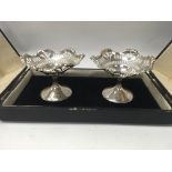 A pair of hallmarked silver cased Bon Bon dishes,