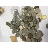 A quantity of used circulated two shilling coins a