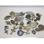 A collection of approx 40 religious pendants and c