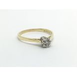 An 18carat gold ring set with a solitaire diamond ring size R-S