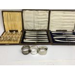 Three silver napkin rings a cased set of silver sp