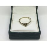 A 9ct gold diamond ring, approx 0.8g and approx si