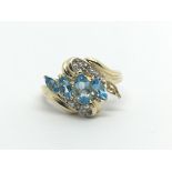A 9ct gold ring set with topaz and diamonds, missing stone, approx 3.7g and approx size R.