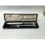 A hallmarked silver Oversized cased Knife and fork