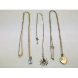 Three 9ct gold pendants on chains comprising a hea