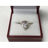 A 9ct gold and large shaped CZ solitaire ring.