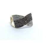 A 9ct gold, red and white diamond ring, approx 2.8g and approx size Q.