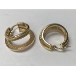 A pair of 14ct gold Greek key design double hoop e