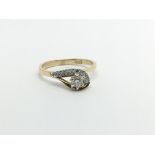 An 18ct gold ring set with diamonds, approx 2g and approx size I-J.