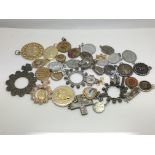 A collection of approx 40 religious pendants and p