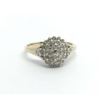 A 9ct gold diamond cluster ring, approx.25ct, approx 2.2g and approx size M-N.
