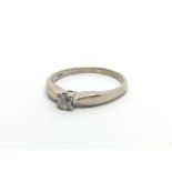 An 18ct white gold solitaire diamond ring, approx 3.2g and approx size P.