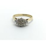 An 18ct gold diamond cluster ring, approx .25ct, a