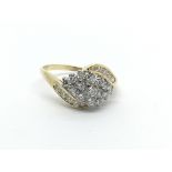 An 18ct gold twenty five stone diamond ring, approx .66ct, approx 4.1g and approx size Q.