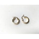 A pair of 14ct gold Greek key design hoop earrings