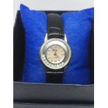 A ladies silver cased watch set with ten topaz sto