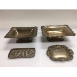 Four silver dishes, various hallmarks and sizes.