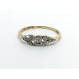 An 18ct gold ring set with diamonds, aporox 1.4g a