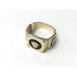 A 14ct gold Versace style Ring. 8.5g and approx P.