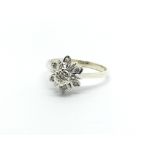 A 9ct gold seven stone diamond cluster ring, approx 2.7g and approx size M-N.