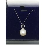 A 9ct white gold and pearl necklace.