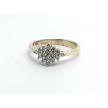 A 9ct gold diamond cluster ring, approx 2g and approx size K-L.